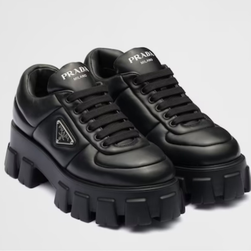 PRADA
Monolith padded leather lace-up shoes